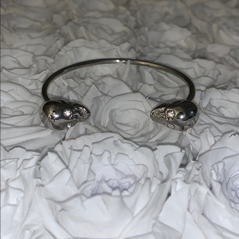 Skull bracelets with fake diamonds in eyes.